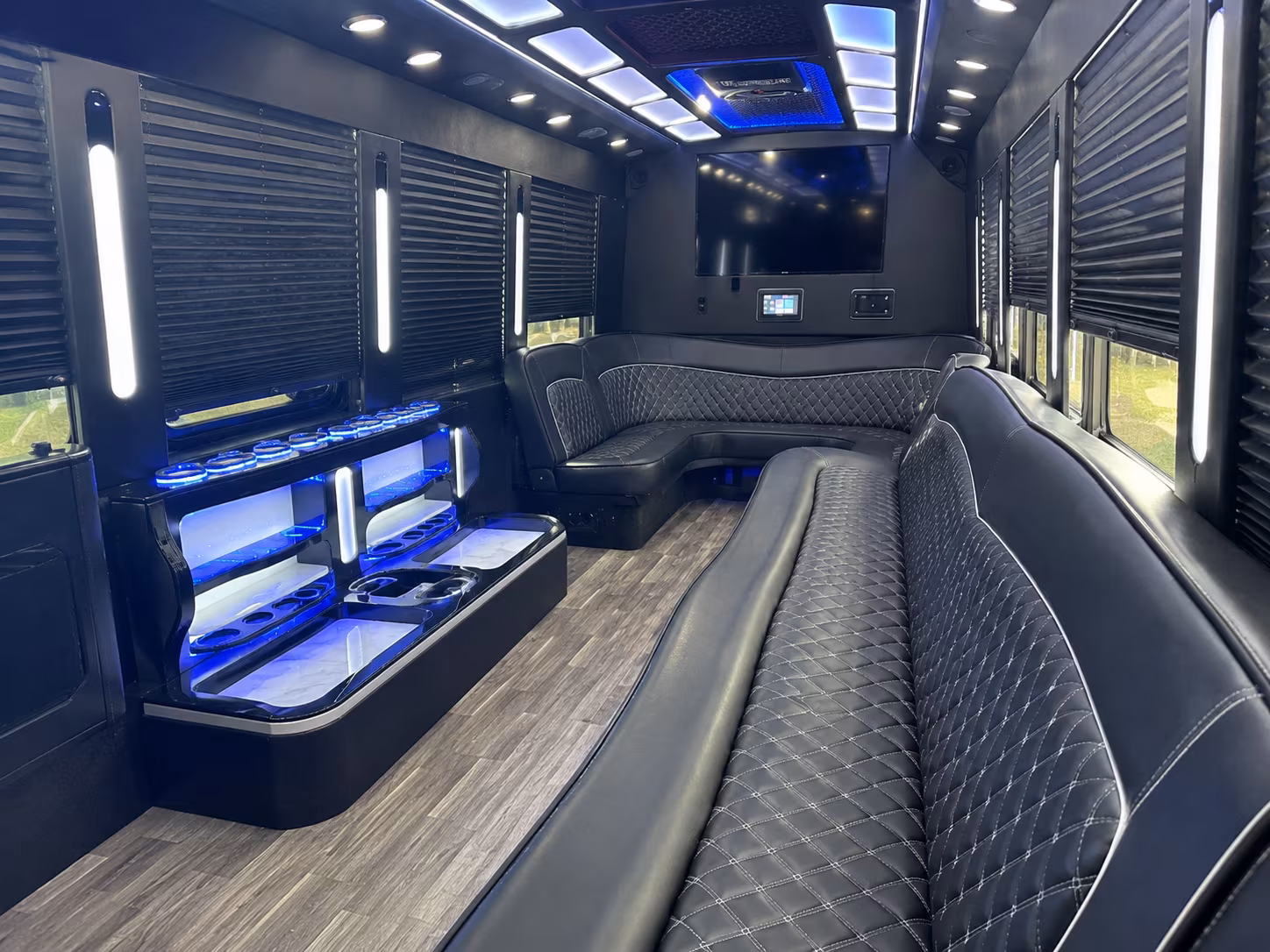 Wedding guests seated inside a party bus serving Yonkers